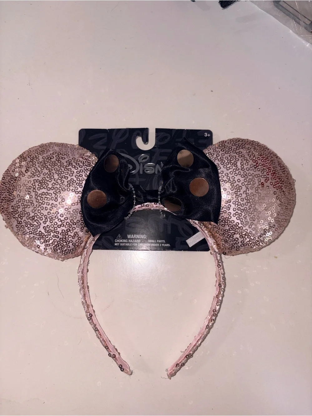 Disney Sequin Minnie Ears Headband in Rose Gold with Black Bow